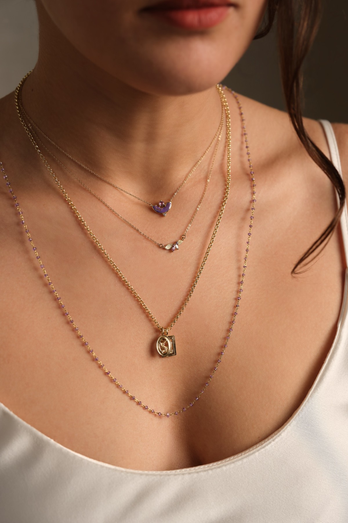 Layered necklaces on a model